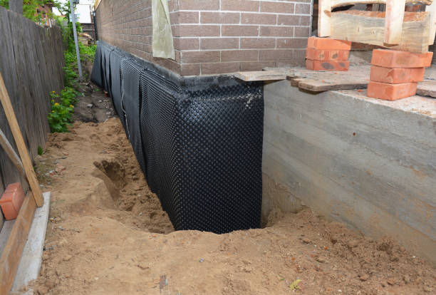 Happy homeowners after waterproofing job in Battle Ground